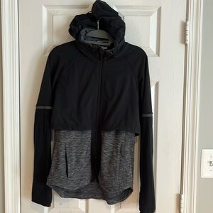 Athleta grey and black jacket women’s size XS with hide away hood